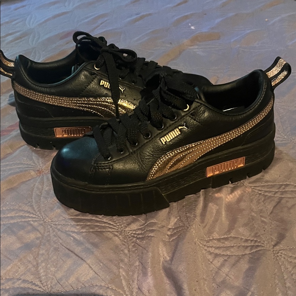 Puma Black Sneakers with Gold Highlights